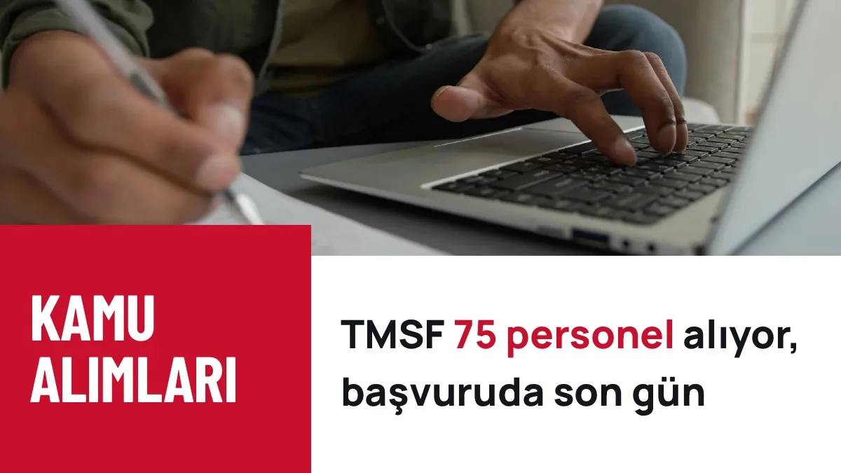 Fosforlu sarı montlu ve beyaz bareli iki kişi yapım aşamasındaki binada büyük bir planı inceliyor, arkadan çekim